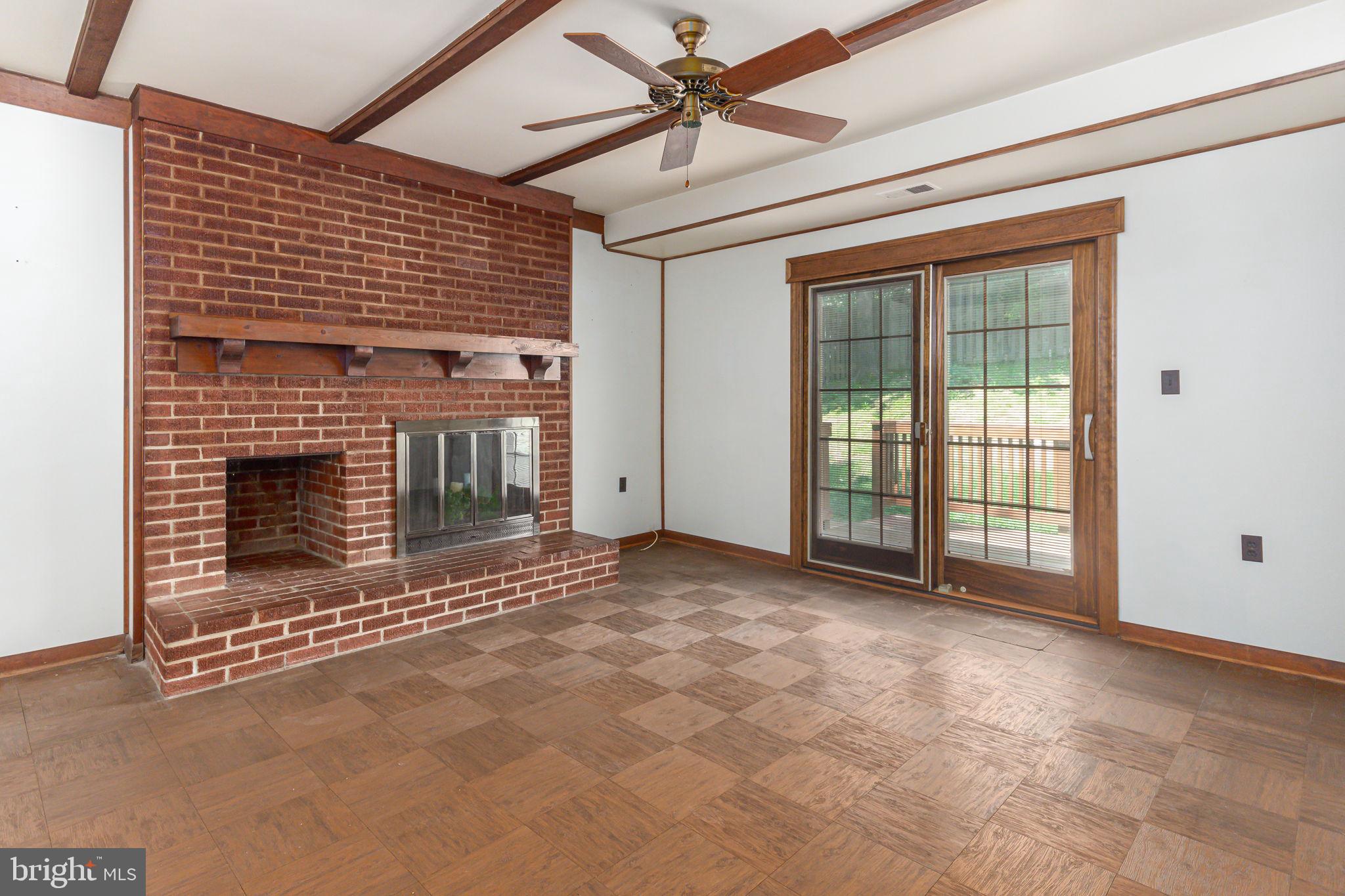 8404 Margo Road Lanham, MD 20706 - Photo 14 of 32 Family room with fireplace