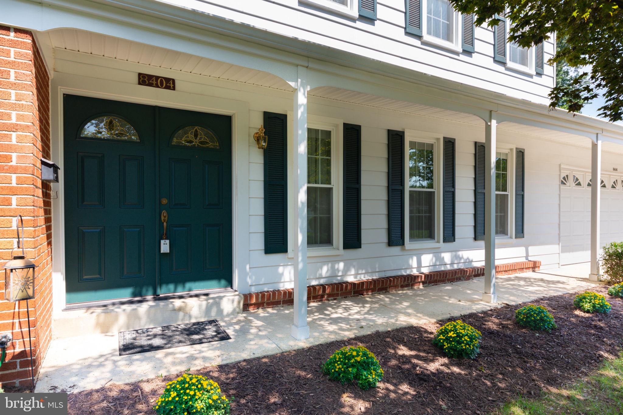 8404 Margo Road Lanham, MD 20706 - Photo 3 of 32 Covered front porch with double doors to home.