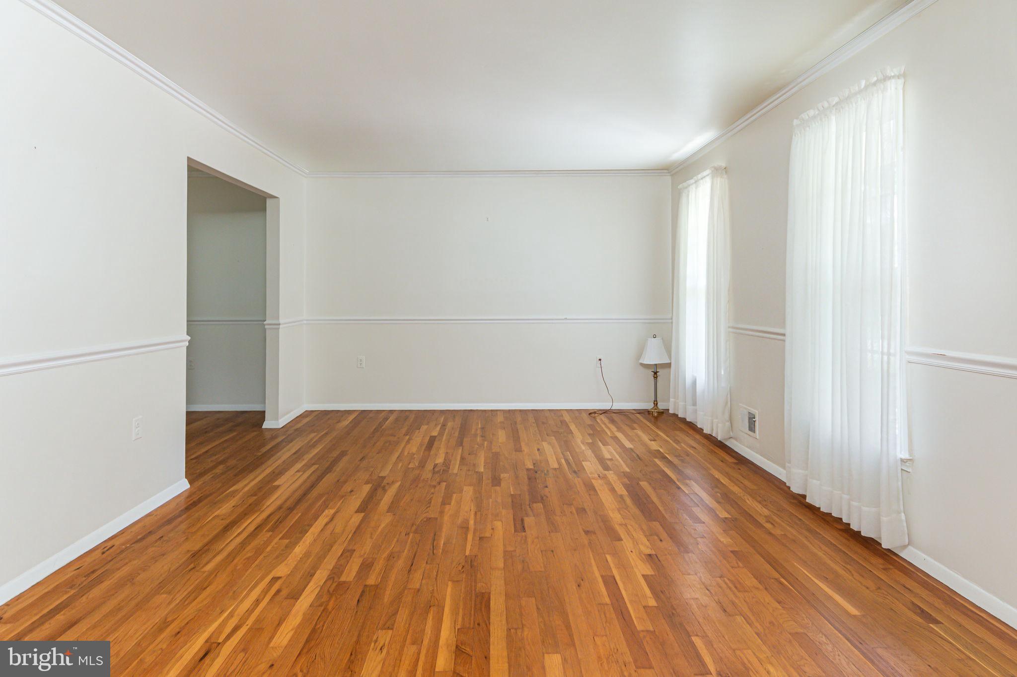 8404 Margo Road Lanham, MD 20706 - Photo 5 of 32 living room with beautiful hardwood floors