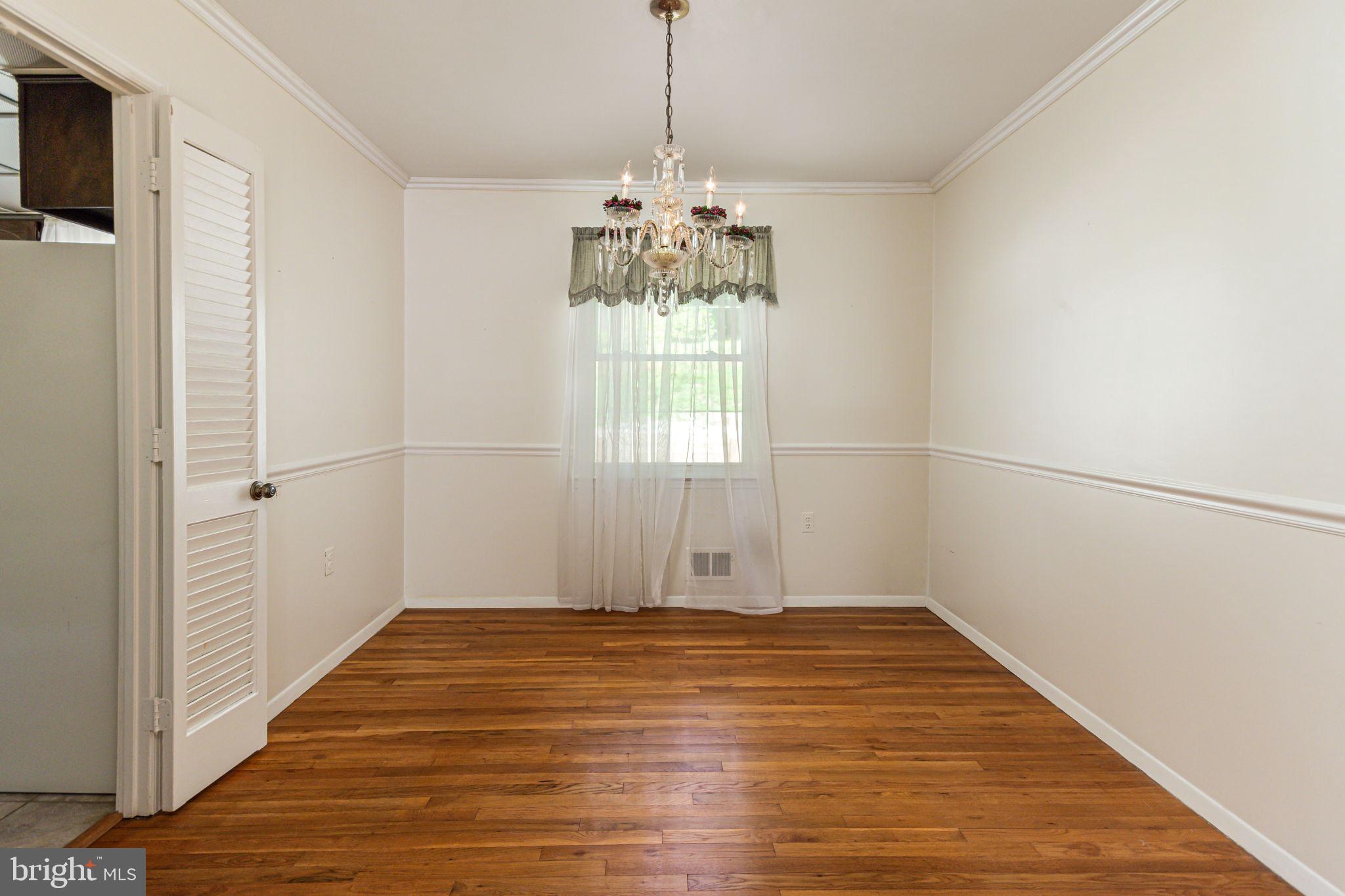 8404 Margo Road Lanham, MD 20706 - Photo 8 of 32 dining room with hardwood floors
