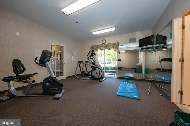 a view of a room with gym equipment