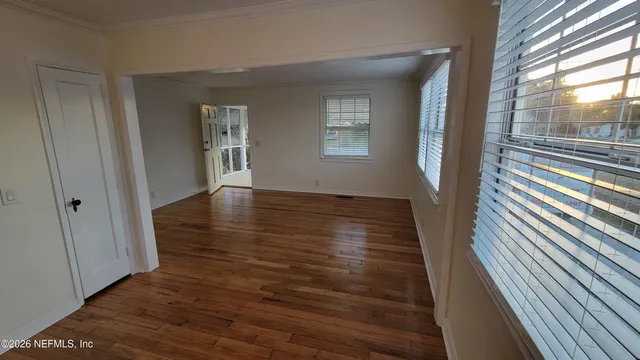 a view of an empty room and window