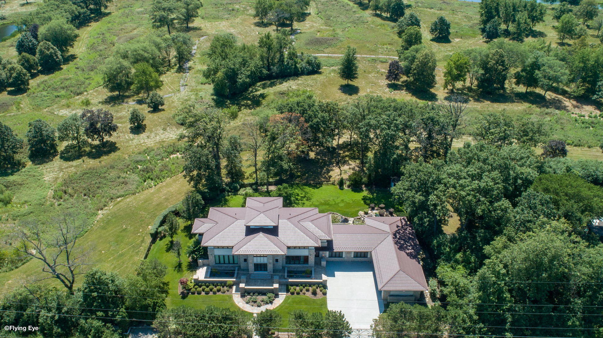 925 Morrison Road Northbrook, IL 60062 - Photo 2 of 75 an aerial view of a house with a yard basket ball court and outdoor seating