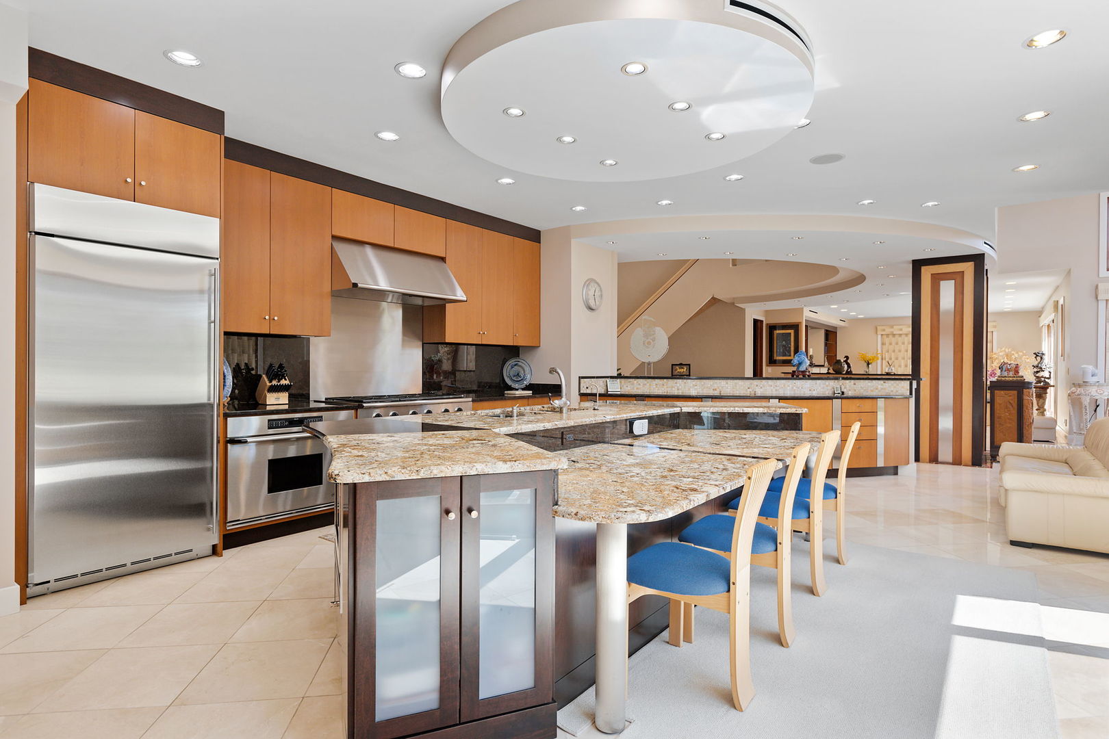 925 Morrison Road Northbrook, IL 60062 - Photo 13 of 75 a kitchen with stainless steel appliances granite countertop a stove top oven a sink and a refrigerator