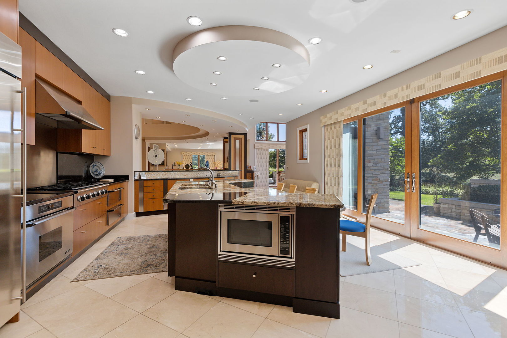 925 Morrison Road Northbrook, IL 60062 - Photo 14 of 75 a kitchen with stainless steel appliances granite countertop a stove and a sink
