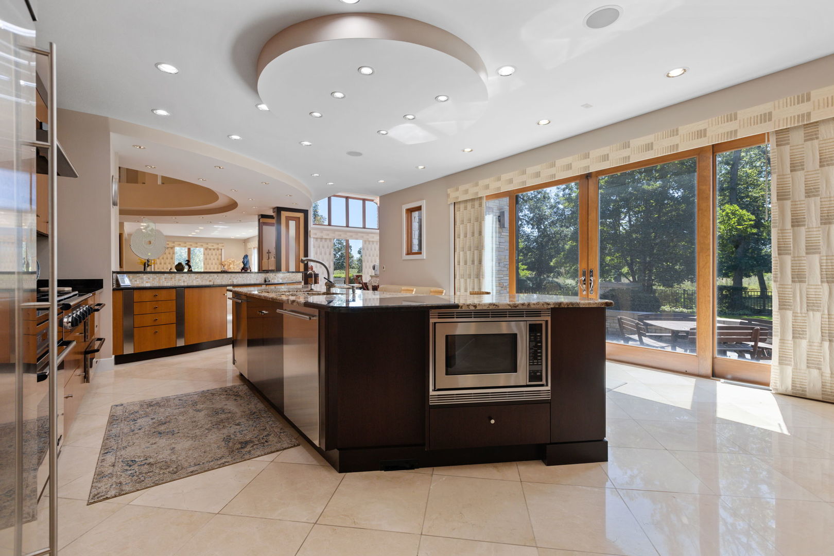 925 Morrison Road Northbrook, IL 60062 - Photo 15 of 75 a kitchen with stainless steel appliances granite countertop a stove and a sink