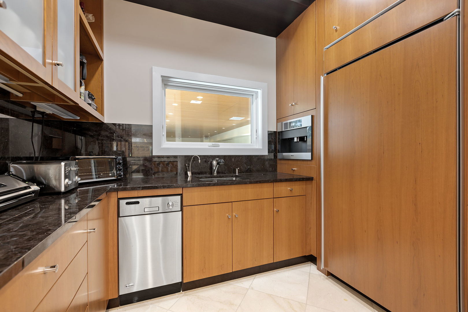 925 Morrison Road Northbrook, IL 60062 - Photo 17 of 75 a kitchen with granite countertop white cabinets and stainless steel appliances