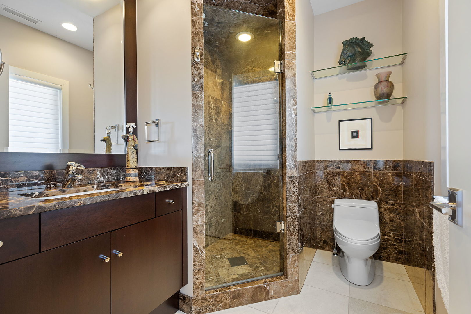 925 Morrison Road Northbrook, IL 60062 - Photo 60 of 75 a bathroom with a toilet sink and shower