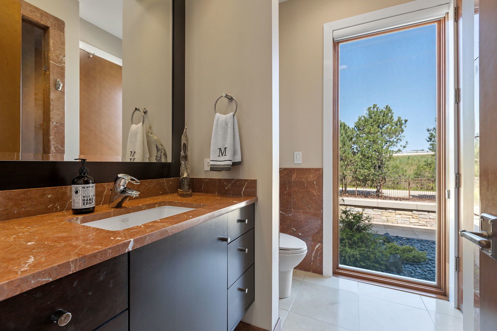 925 Morrison Road Northbrook, IL 60062 - Photo 62 of 75 a bathroom with a granite countertop sink and a mirror