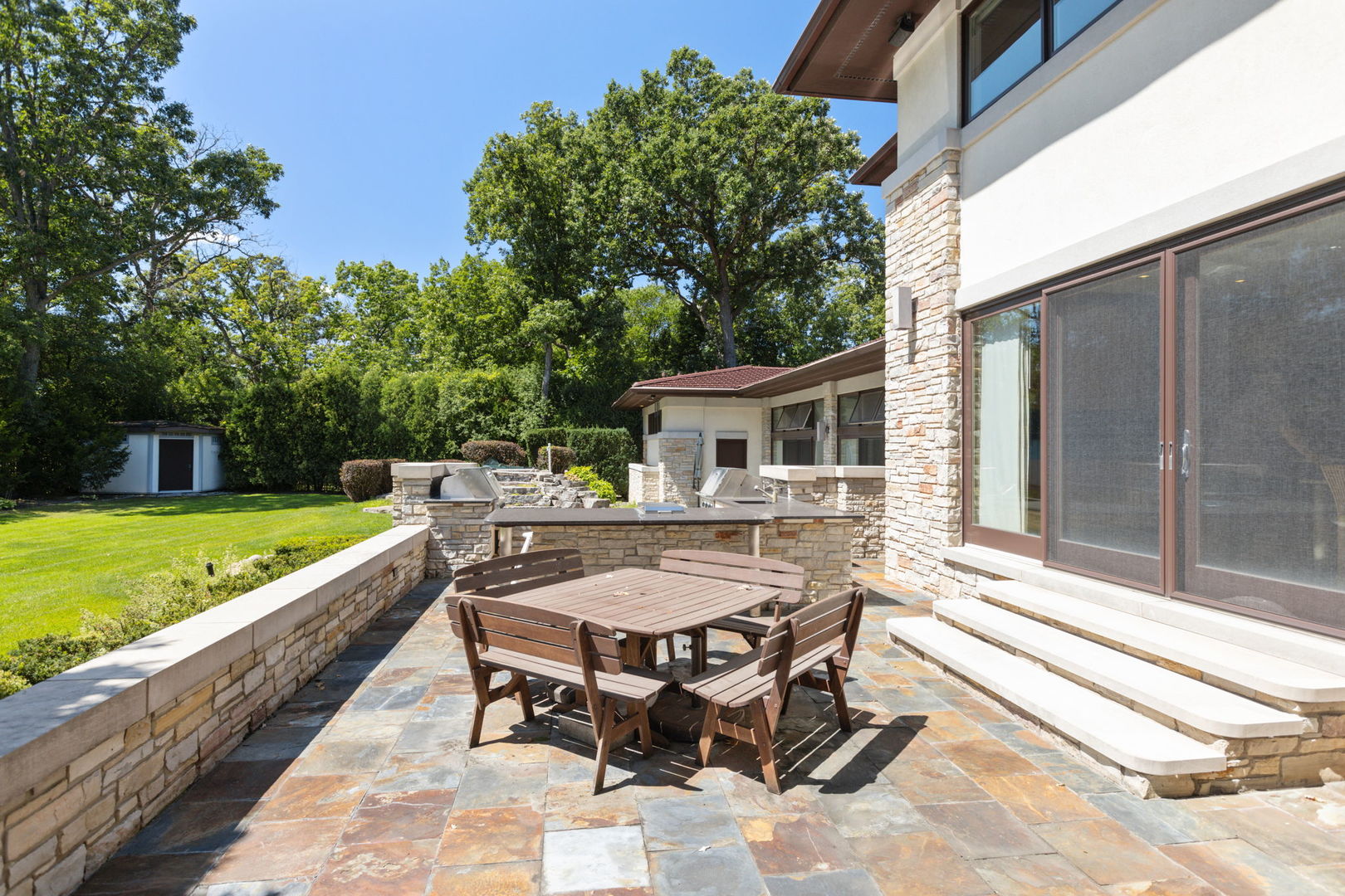 925 Morrison Road Northbrook, IL 60062 - Photo 65 of 75 a view of house with backyard outdoor seating and swimming pool