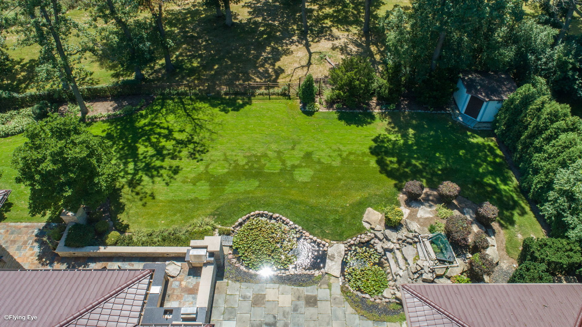 925 Morrison Road Northbrook, IL 60062 - Photo 73 of 75 a view of a lake with a floor to ceiling window plants and lake view