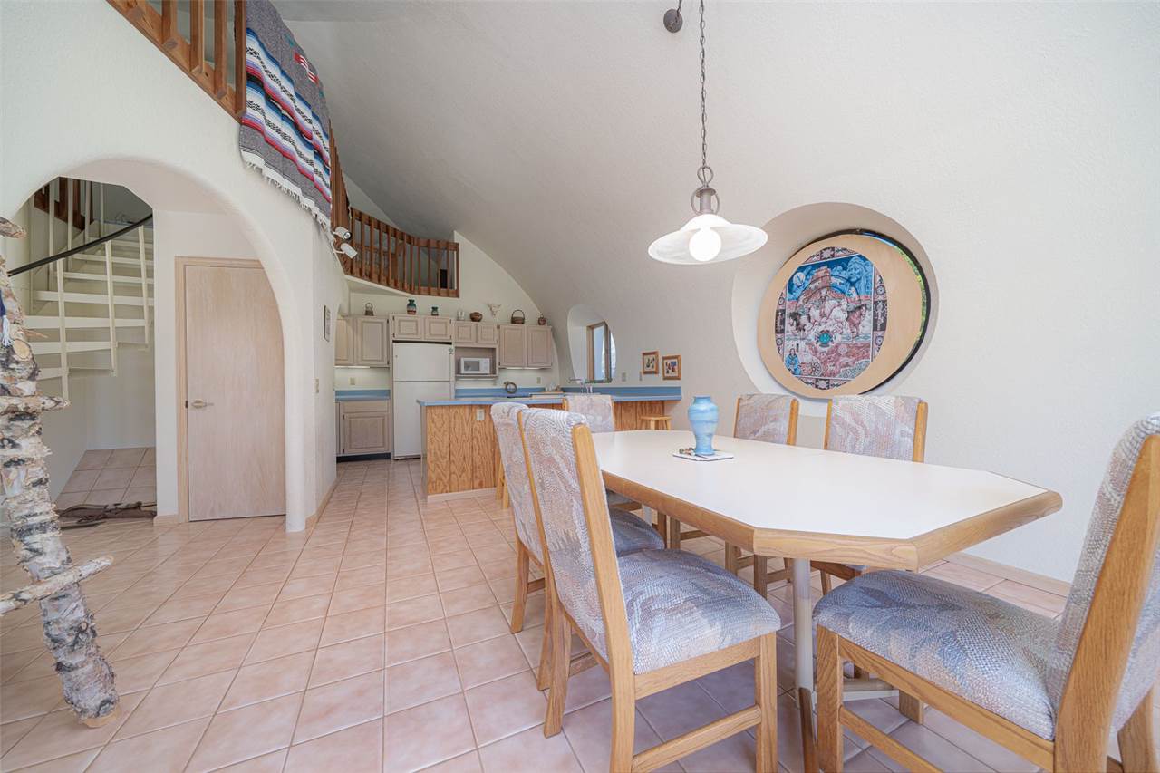 208 New Forest Road Southwest Poplar Grove, IL 61065 - Photo 11 of 40 a dining room with furniture and a table