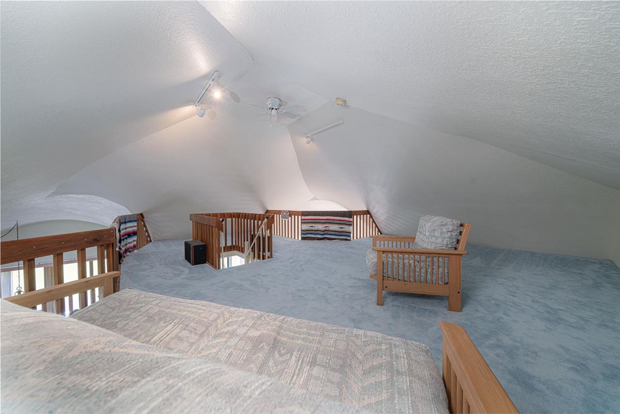 208 New Forest Road Southwest Poplar Grove, IL 61065 - Photo 13 of 40 a room with a wooden floor and furniture