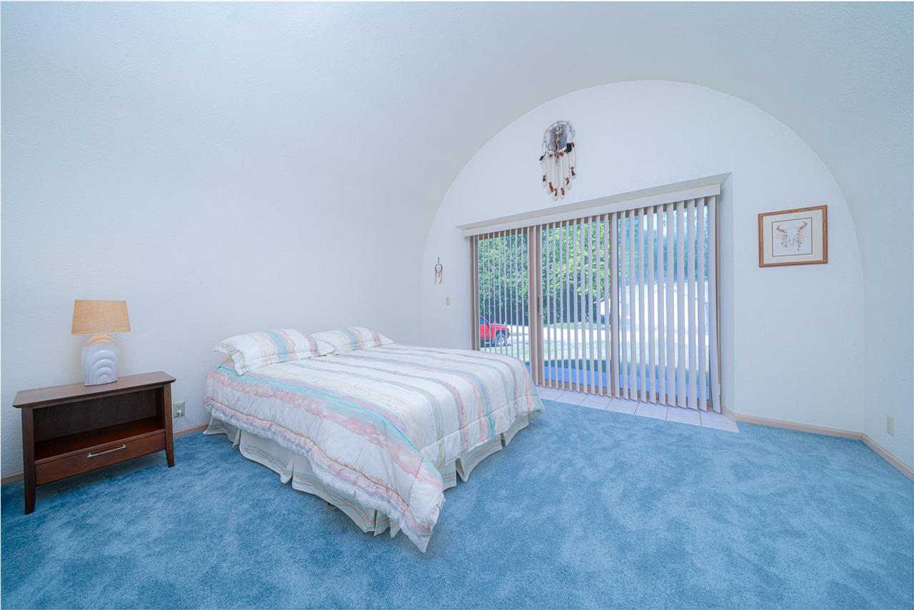 208 New Forest Road Southwest Poplar Grove, IL 61065 - Photo 17 of 40 a bedroom with a bed and a window