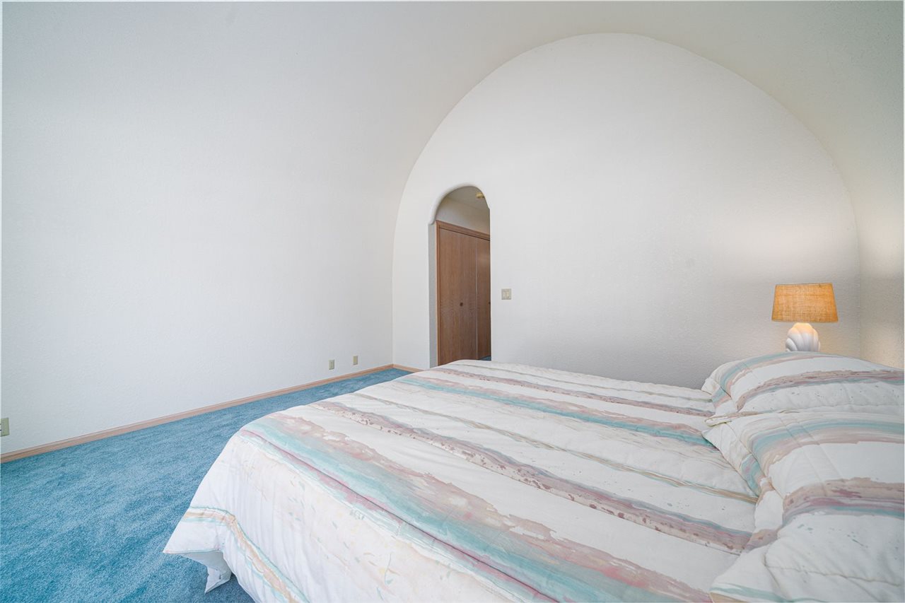 208 New Forest Road Southwest Poplar Grove, IL 61065 - Photo 18 of 40 a bedroom with a bed and a window