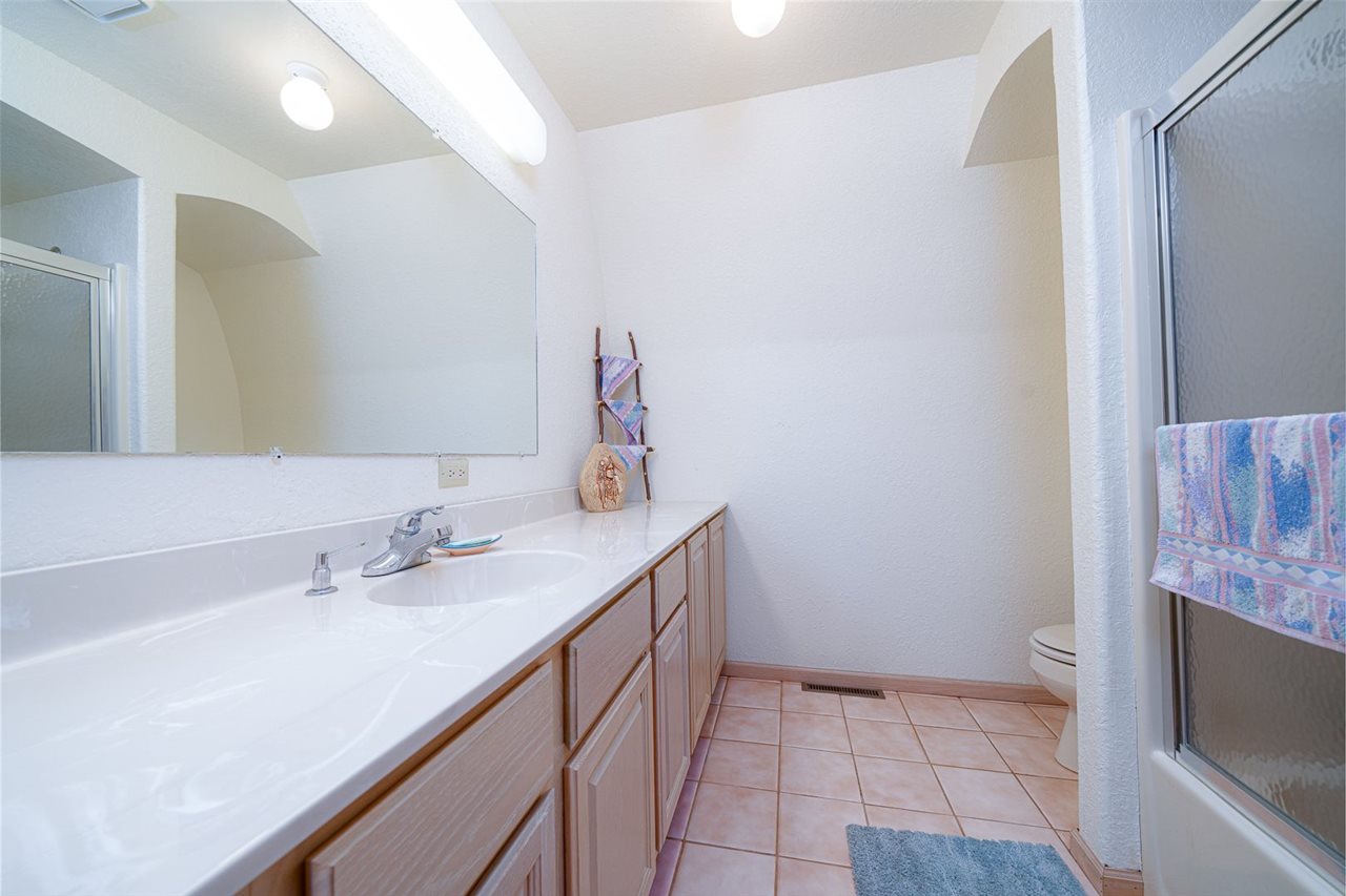 208 New Forest Road Southwest Poplar Grove, IL 61065 - Photo 23 of 40 a bathroom with a sink and a mirror