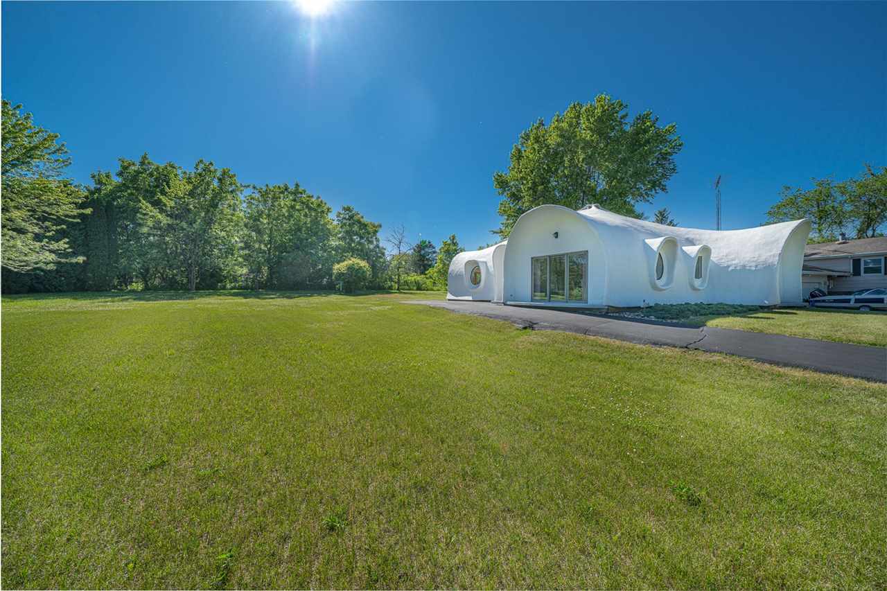 208 New Forest Road Southwest Poplar Grove, IL 61065 - Photo 30 of 40 a view of a house with a big yard