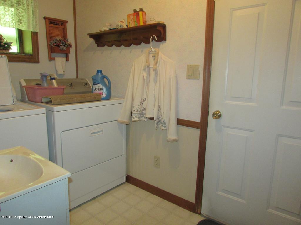 91 Turkey Path Road Wyalusing, PA 18853 - Photo 12 of 22 a bathroom with a sink and a shower