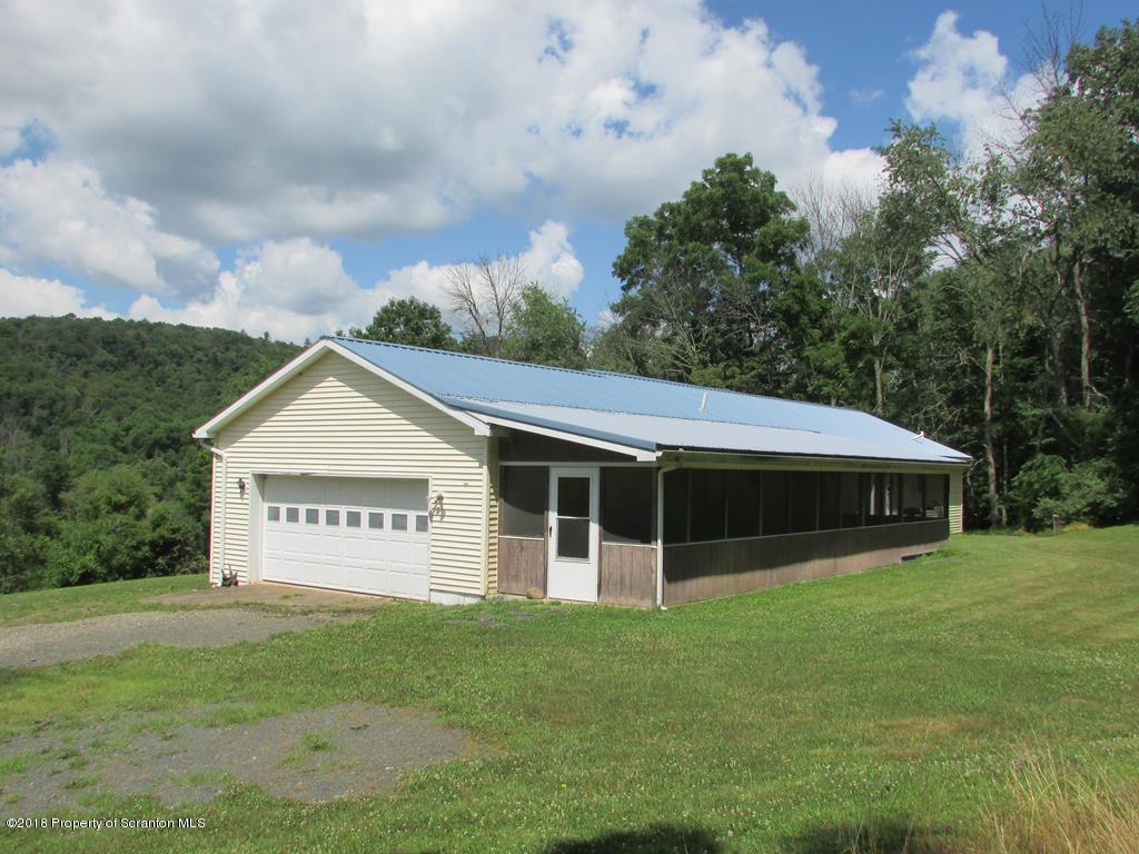 91 Turkey Path Road Wyalusing, PA 18853 - Photo 19 of 22 a view of a house with a backyard