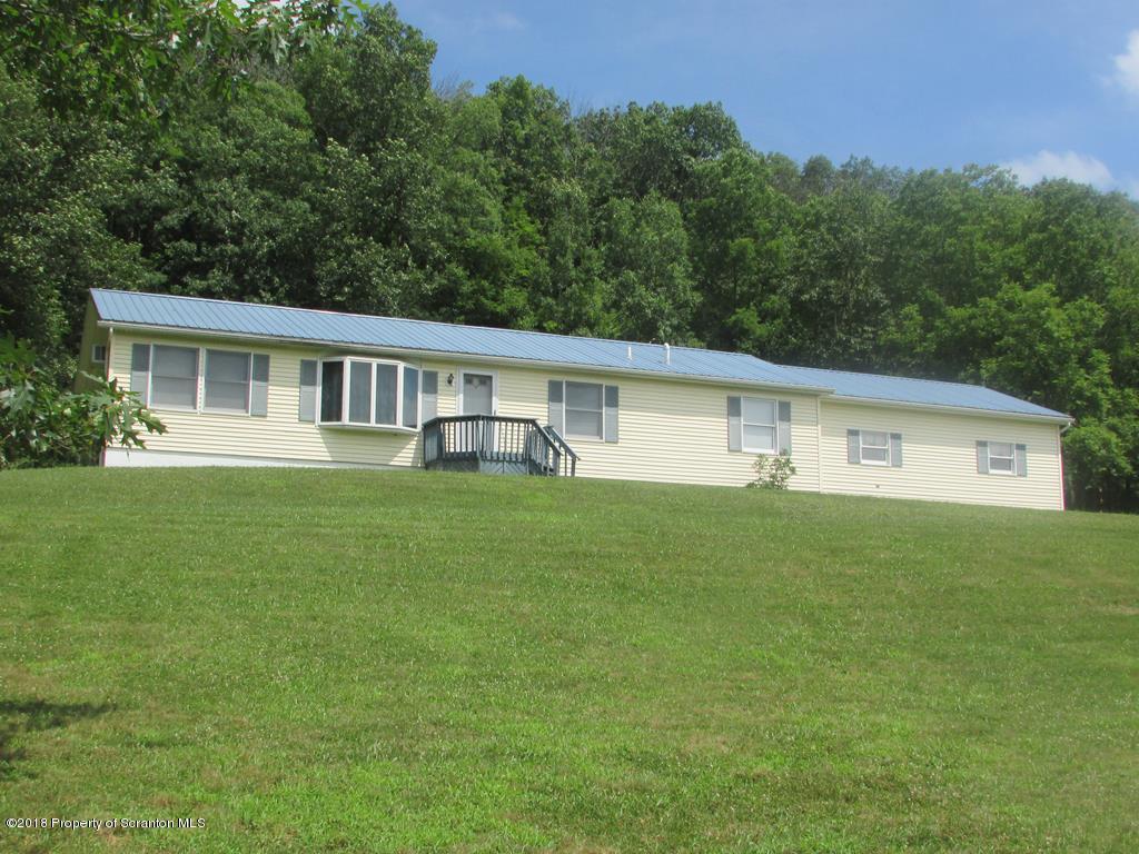 91 Turkey Path Road Wyalusing, PA 18853 - Photo 2 of 22 a front view of house with yard and green space