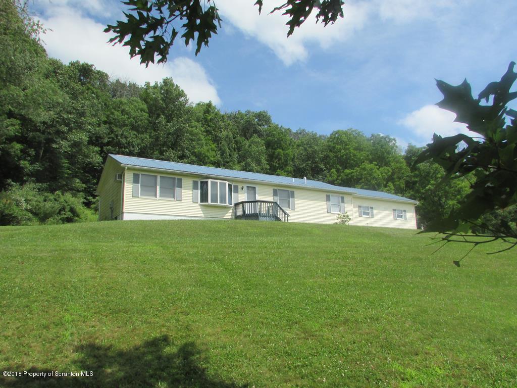 91 Turkey Path Road Wyalusing, PA 18853 - Photo 22 of 22 a house view with a garden space