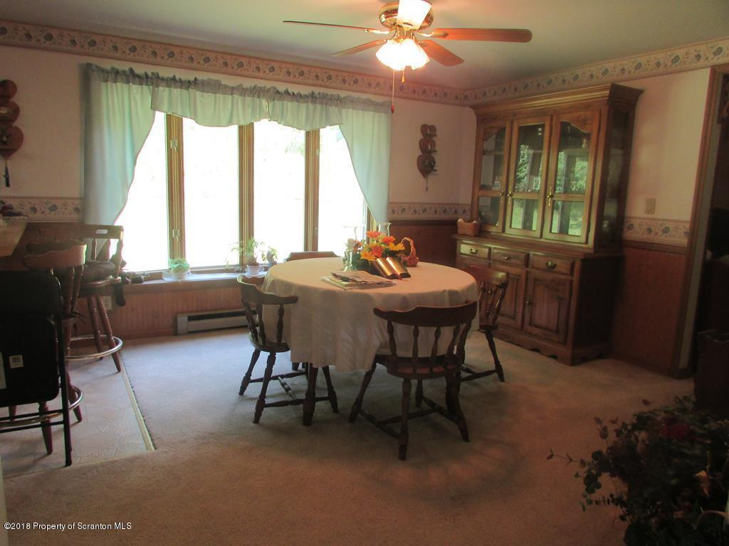 91 Turkey Path Road Wyalusing, PA 18853 - Photo 4 of 22 a dining room with furniture and window