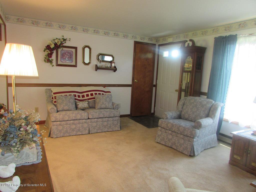 91 Turkey Path Road Wyalusing, PA 18853 - Photo 5 of 22 a living room with furniture and a couch