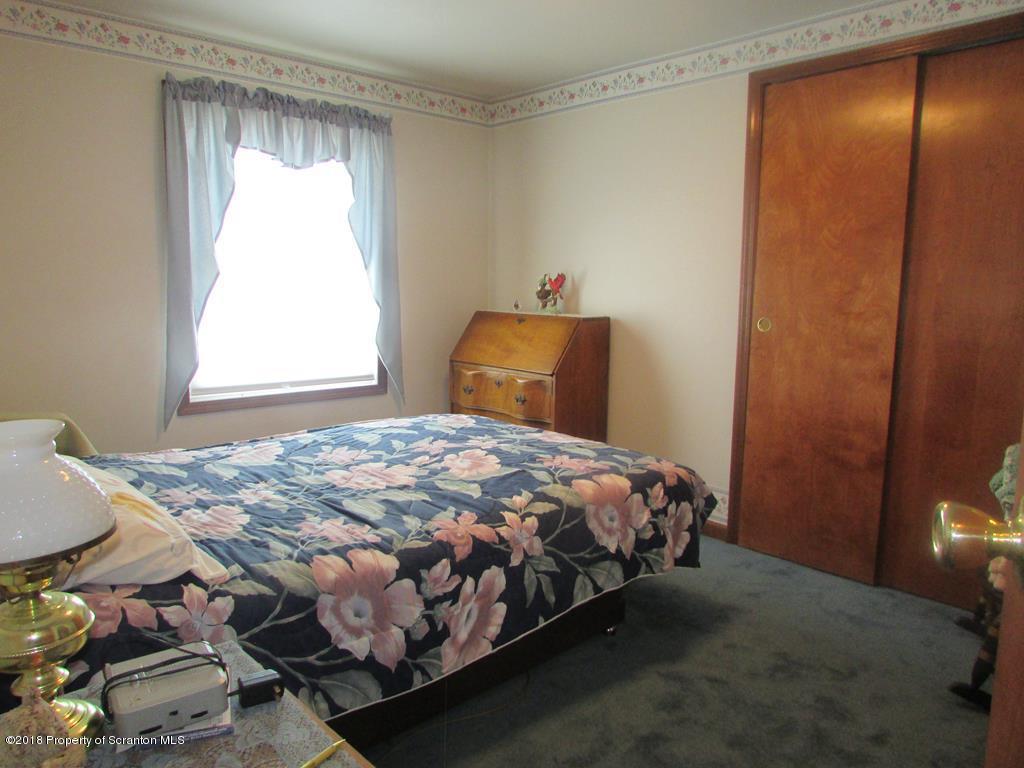 91 Turkey Path Road Wyalusing, PA 18853 - Photo 9 of 22 a bedroom with a bed and a window