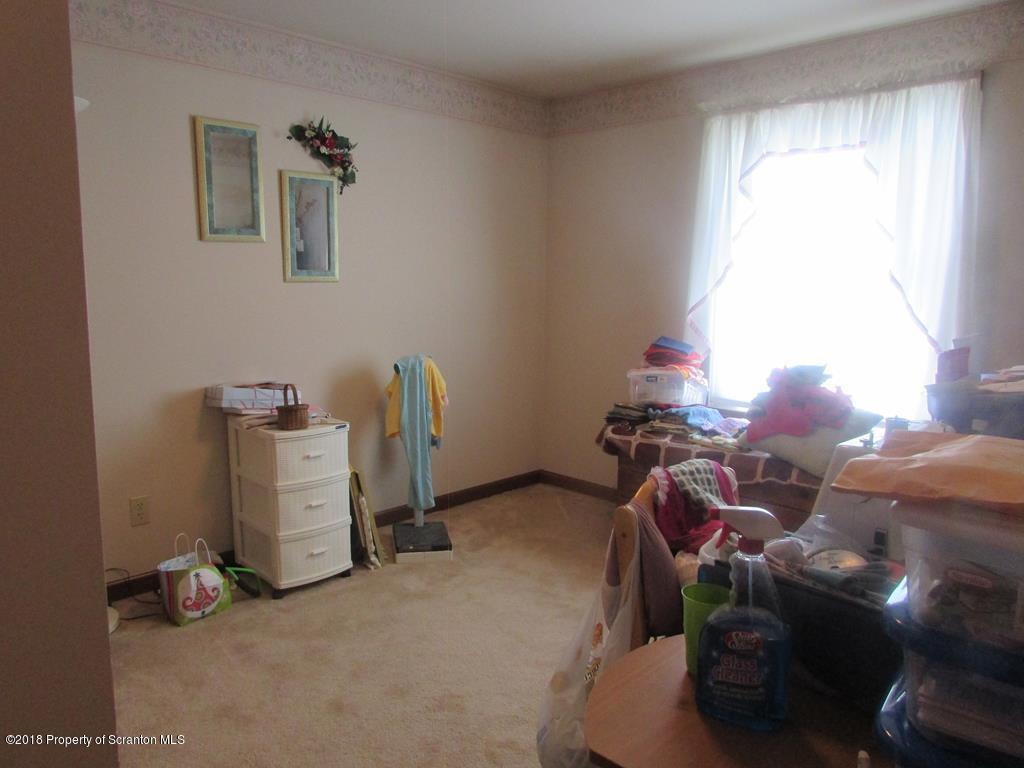 91 Turkey Path Road Wyalusing, PA 18853 - Photo 10 of 22 a room with furniture and a window