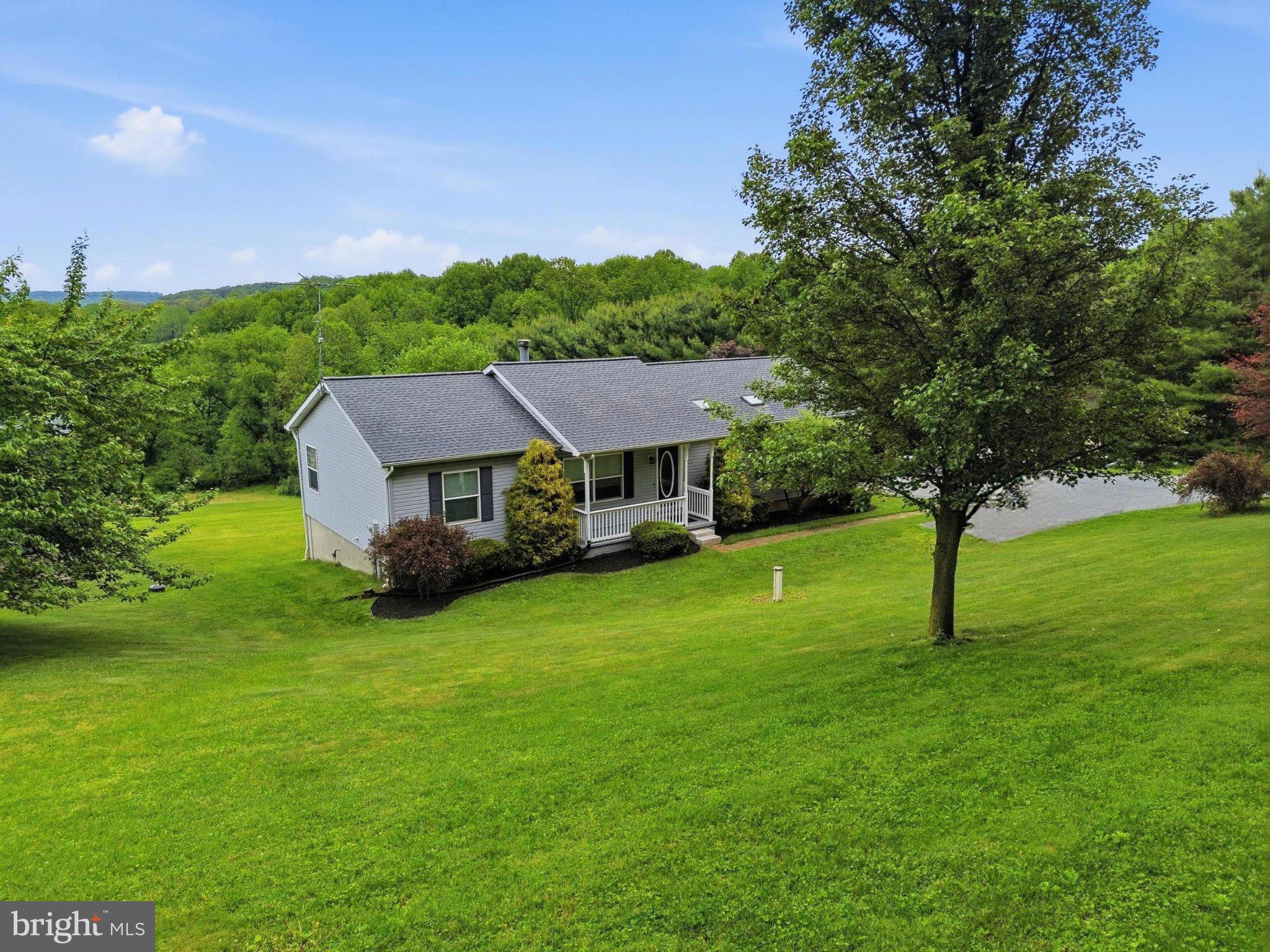 491 Garvine Mill Road Fawn Grove, PA 17321 - Photo 35 of 47 a view of a house with a big yard