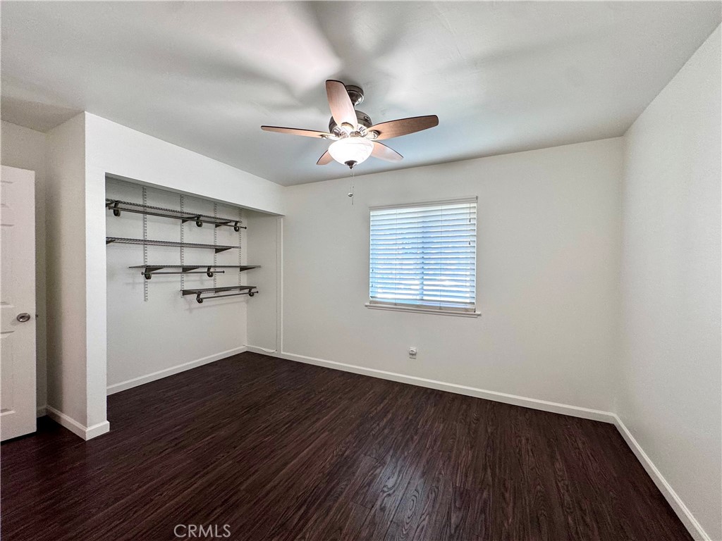 4692 Heil Avenue Huntington Beach, CA 92649 - Photo 11 of 27 wooden floor in an empty room with a window