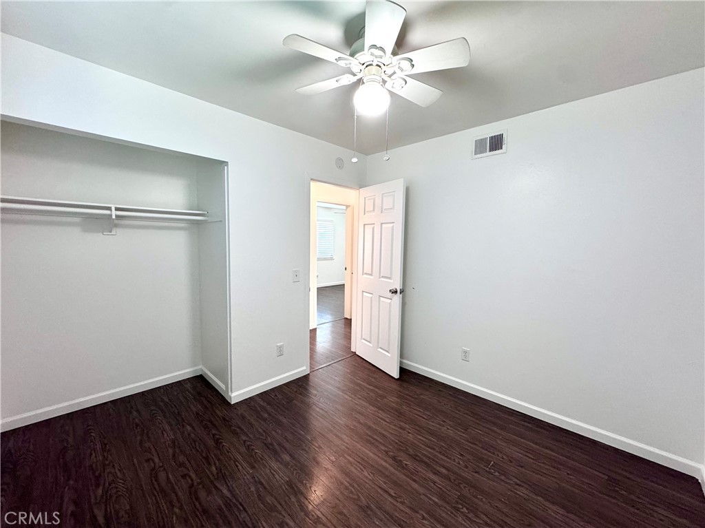 4692 Heil Avenue Huntington Beach, CA 92649 - Photo 14 of 27 a view of an empty room with wooden floor