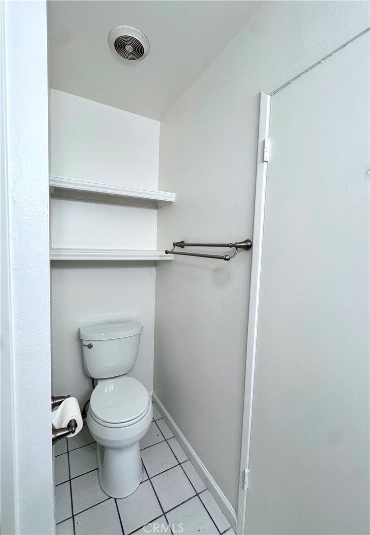 4692 Heil Avenue Huntington Beach, CA 92649 - Photo 8 of 27 a bathroom with a toilet