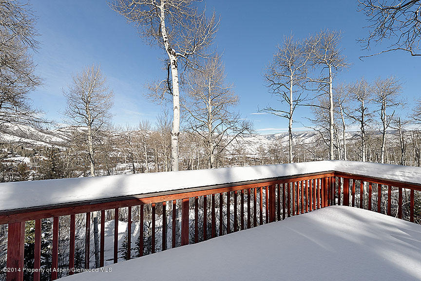47 North Ridge Lane, Unit B Snowmass Village, CO 81615 - Photo 13 of 18 a view of a balcony with wooden fence