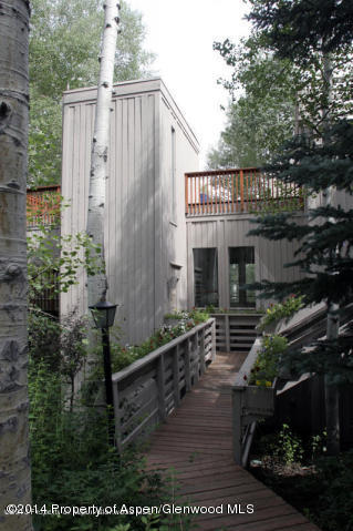 47 North Ridge Lane, Unit B Snowmass Village, CO 81615 - Photo 18 of 18 a sign on the side of a building