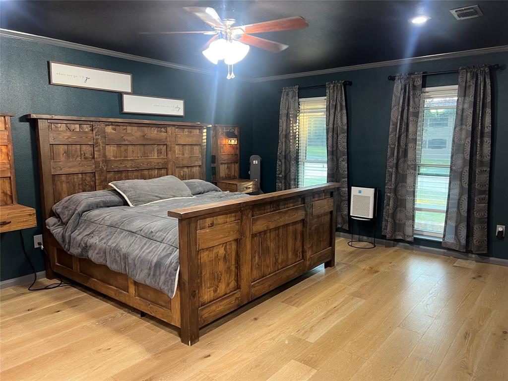 3802 Chisholm Trail Temple, TX 76504 - Photo 12 of 23 a bed sitting in a bedroom next to a window