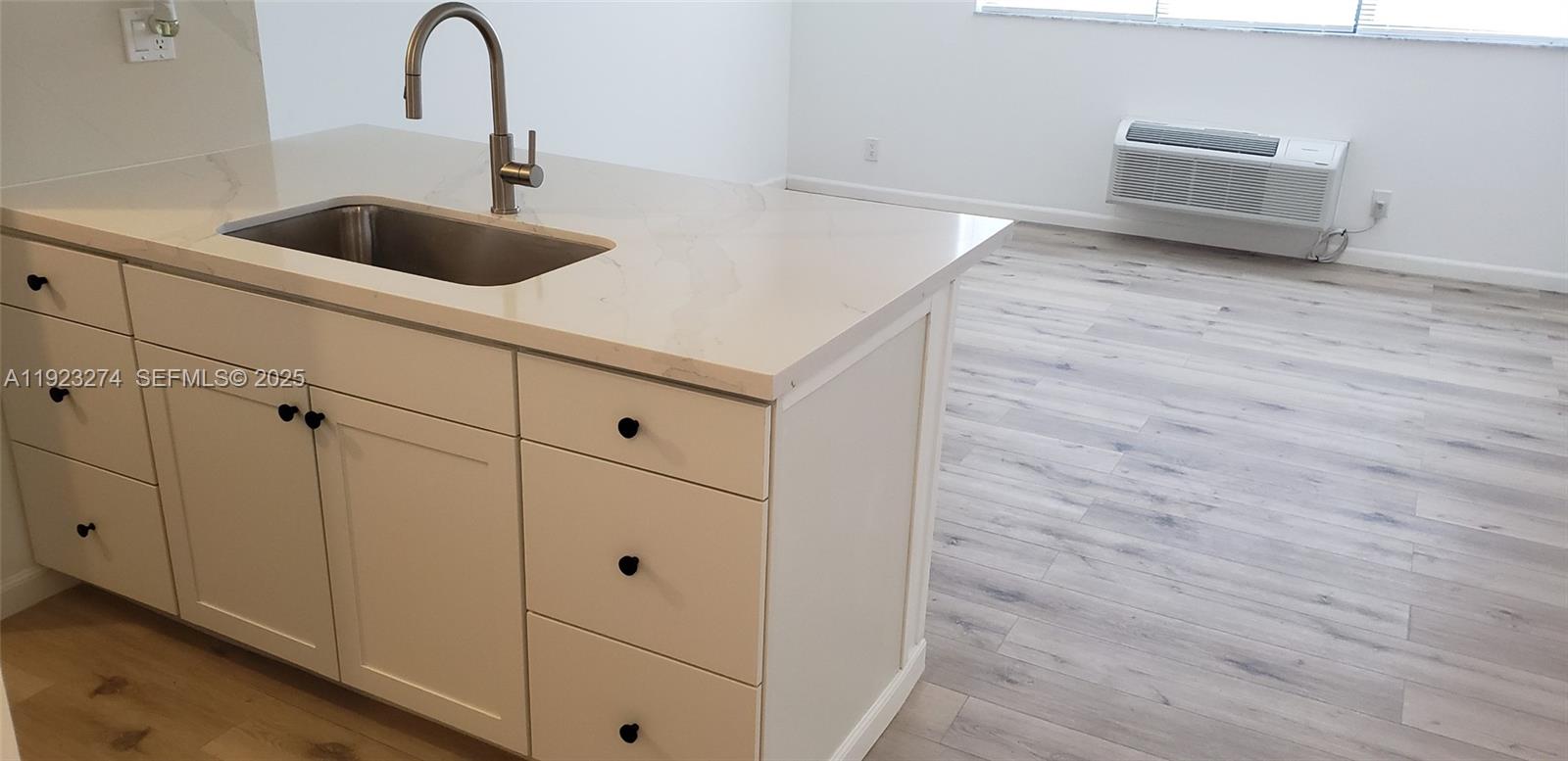 2501 Riverside Drive, Unit 402A Coral Springs, FL 33065 - Photo 3 of 9 a close view of sink and tap