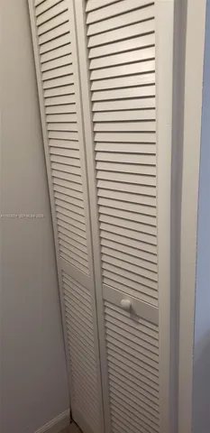 a view of a room with a door