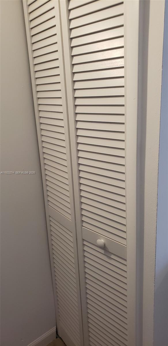 2501 Riverside Drive, Unit 402A Coral Springs, FL 33065 - Photo 5 of 9 a view of a room with a door