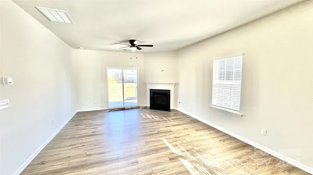 a spacious bathroom with a tub and shower