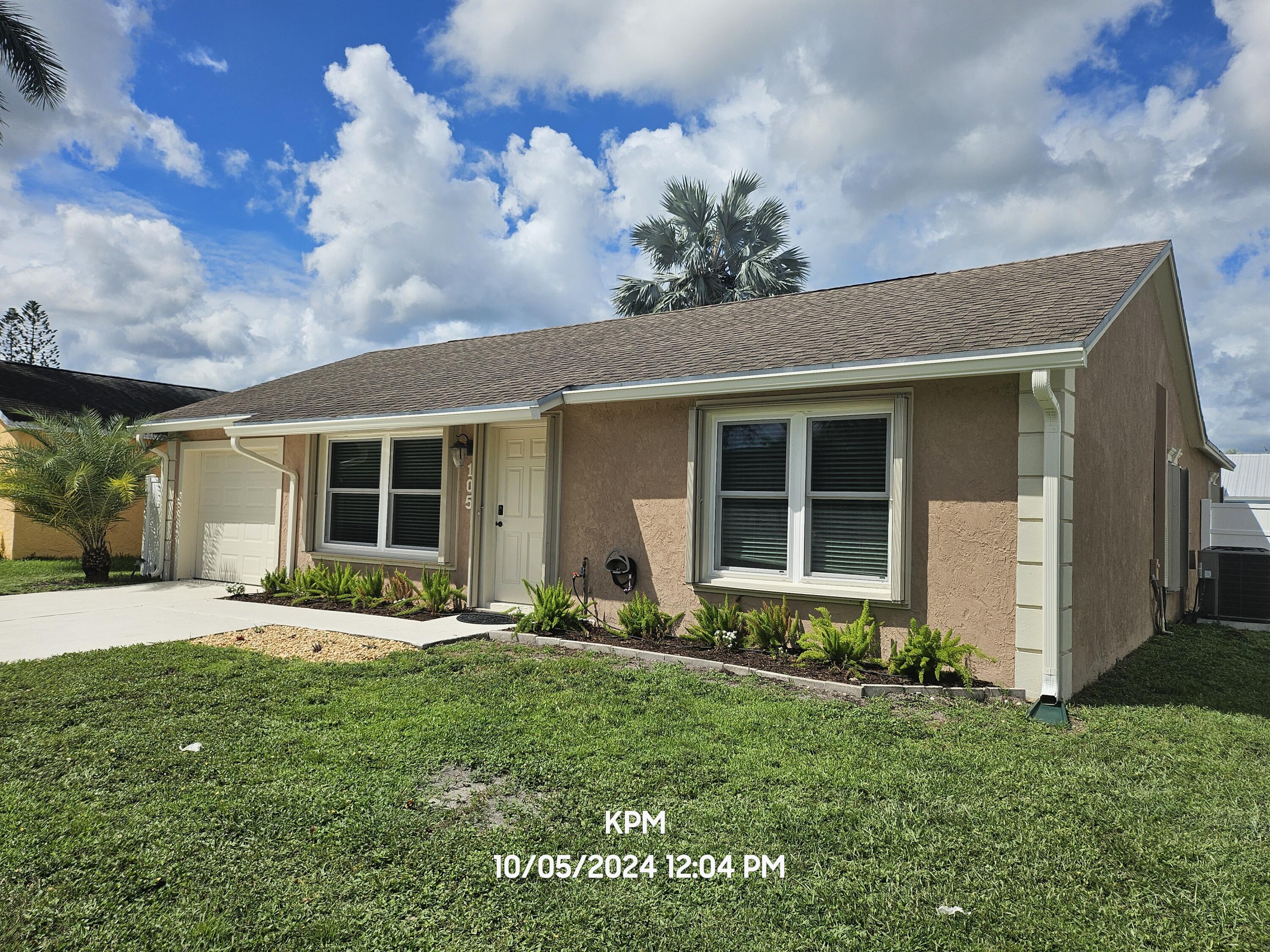 105 Wingate Drive Jupiter, FL 33458 - Photo 2 of 43 20241005_120443