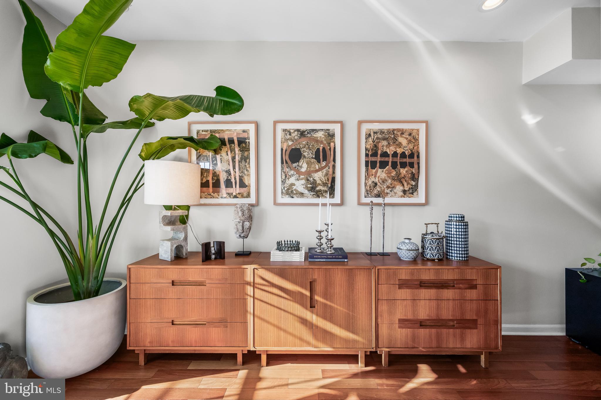 1627 Fairmount Avenue, Unit B Philadelphia, PA 19130 - Photo 16 of 46 a living room with furniture and a potted plant