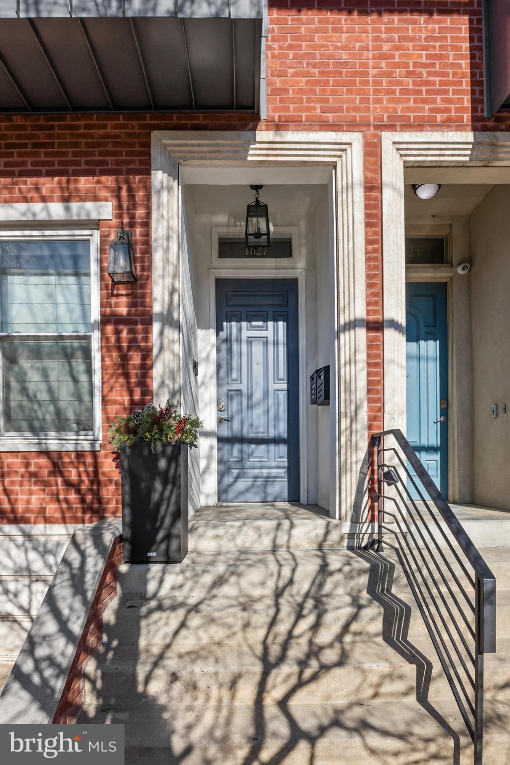 1627 Fairmount Avenue, Unit B Philadelphia, PA 19130 - Photo 3 of 46 a view of a porch with a table and chairs
