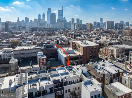 a view of a city with tall buildings