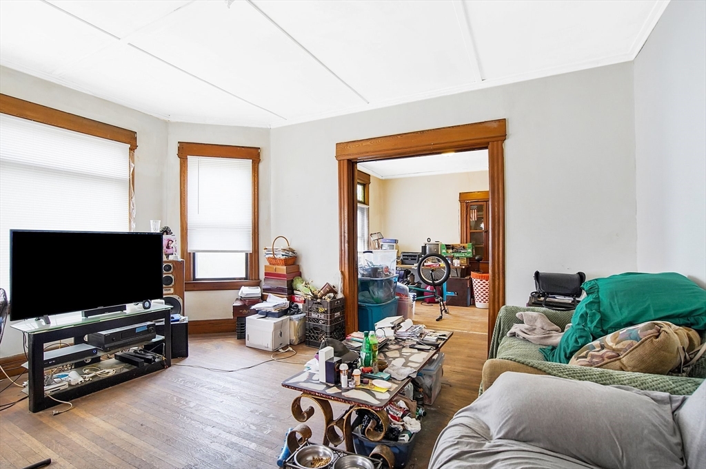 31 Chase Avenue Springfield, MA 01108 - Photo 15 of 29 a living room with furniture and a flat screen tv