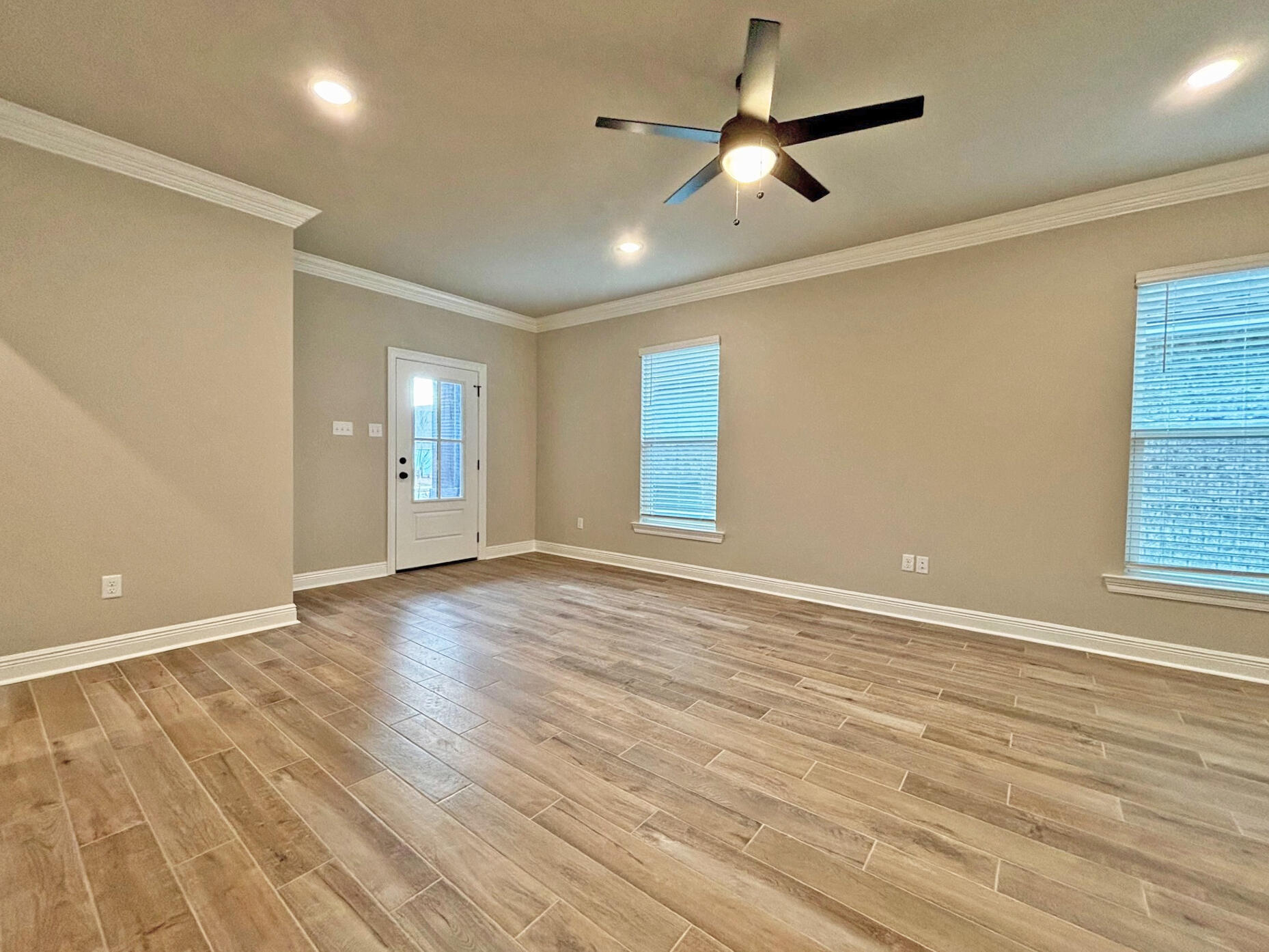 75 Natureview Way Ponce de Leon, FL 32455 - Photo 7 of 23 a view of an empty room with window and wooden floor