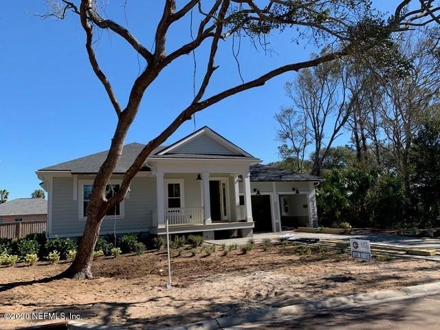 448 Ridgeway Road St. Augustine Beach, FL 32080 - Photo 1 of 23 a front view of a house with garden