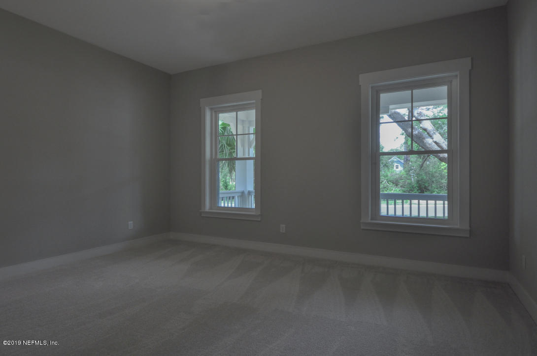 448 Ridgeway Road St. Augustine Beach, FL 32080 - Photo 13 of 23 an empty room with a window