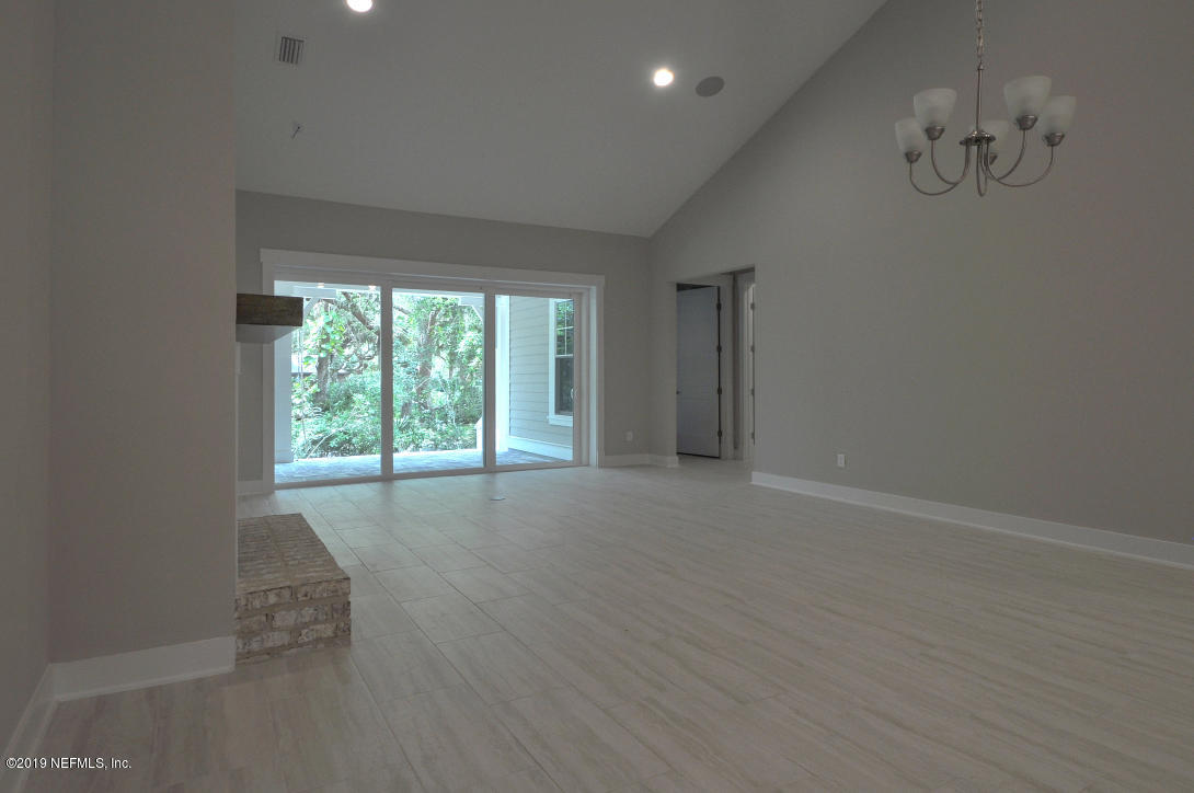 448 Ridgeway Road St. Augustine Beach, FL 32080 - Photo 9 of 23 a view of an empty room with a window