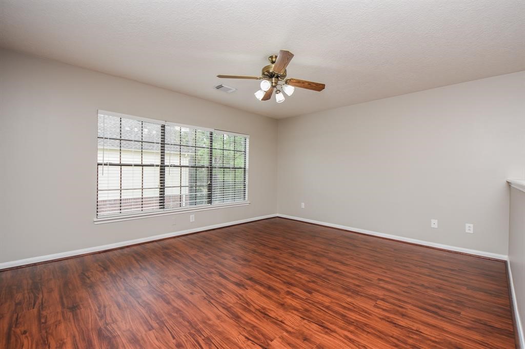 27 West Rumple Creek Place Spring, TX 77381 - Photo 20 of 32 Upstairs you can find a large game room - perfect for indoor activities.